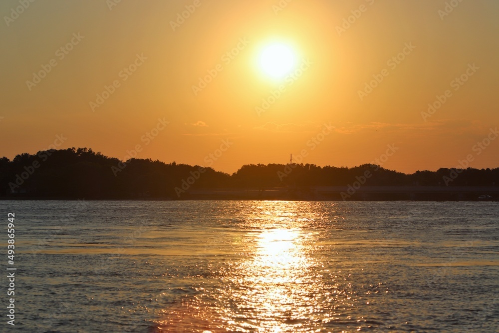 Fototapeta premium sunset over the river
