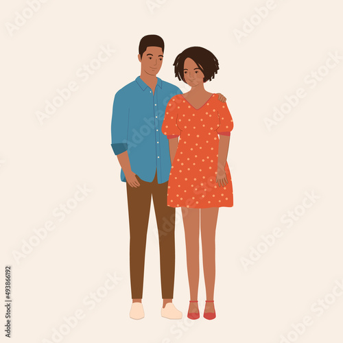 Portrait Of Black Young Couple Smiling And With Arms Around.