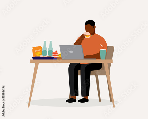 Fat Black Man Eating Unhealthy Food While Working.
