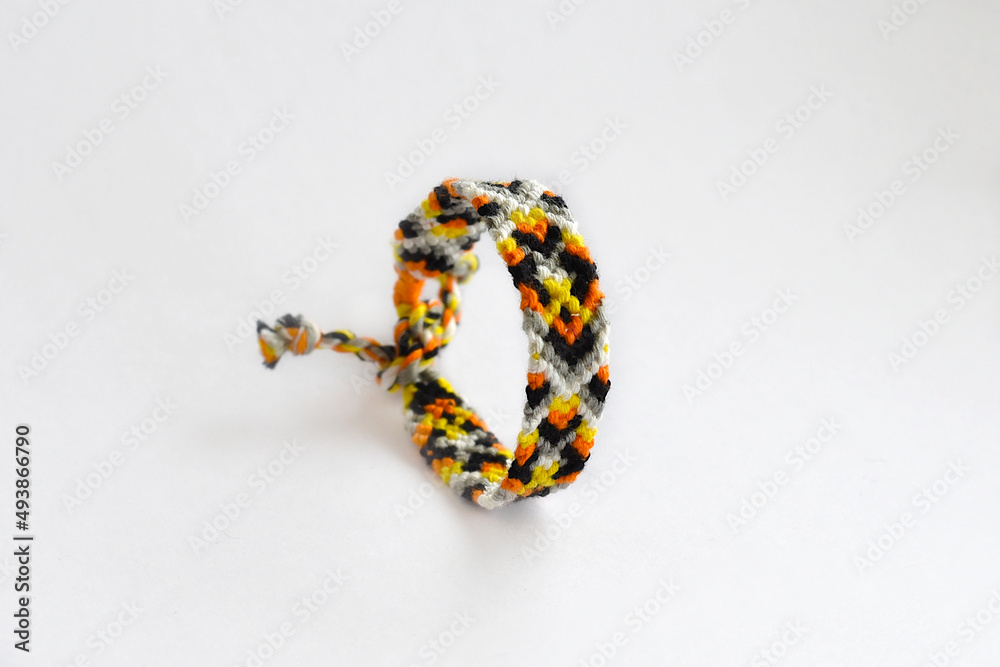 DIY woven friendship bracelets with unusual braiding. Summer accessory DIY woven friendship bracelets with unusual braiding. Summer accessory