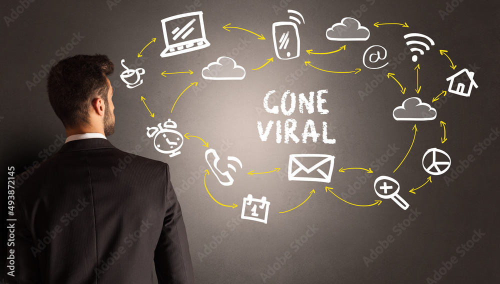 businessman drawing social media icons businessman drawing social media icons