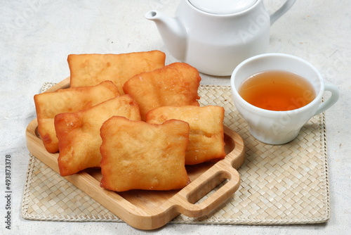 odading or beignet, indonesian fried bread on white background