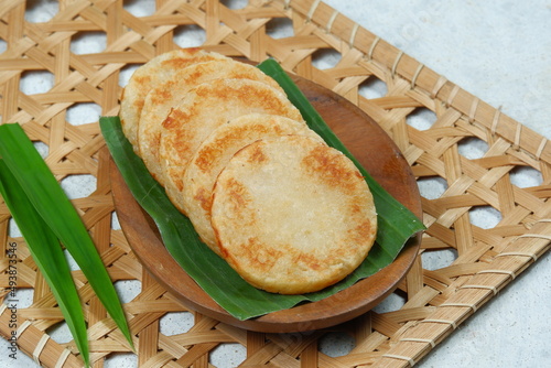 Wingko (wingko babat ) or javanese pancake.is a Indonesian traditional food, a sweet snack made from young coconut, glutinous rice flour and sugar photo