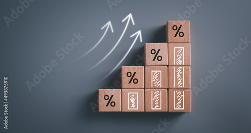 Business development to success and growing growth concept, Wooden blocks with percentage sign and arrow up, represent in meanings of interest rate increase, performance, sales, percent growth.