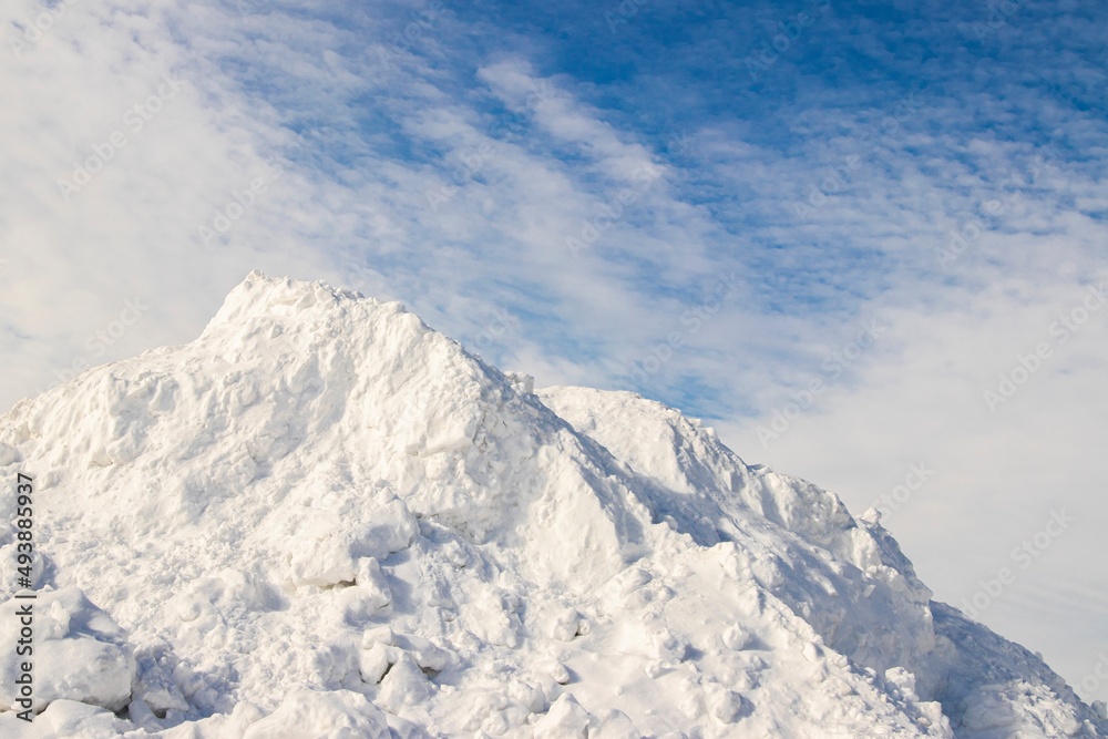 A large pile of snow after a blizzard and snowfall.