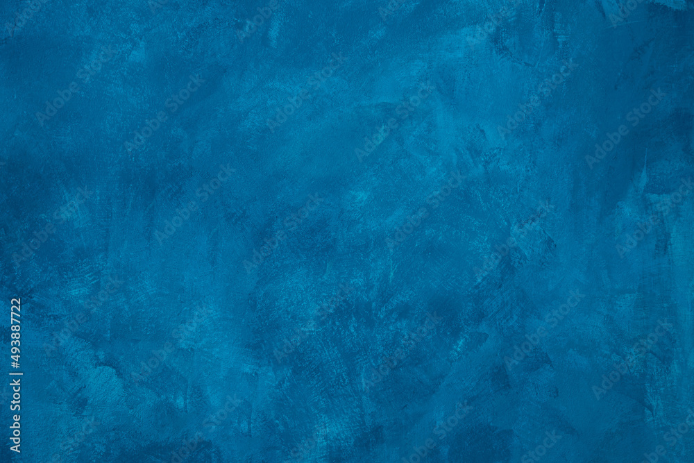 Blue colored abstract textured background. Decorative plaster on the wall