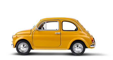Yellow retro toy car isolated on white