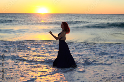 Quadro em tela Full length portrait of  redhead woman wearing elegant gown