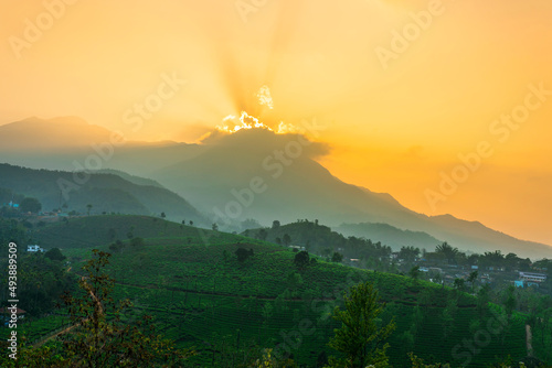 Dramatic sunset view over the mountains, awesome click from Wayanad Kerala, Tea garden scenery photo