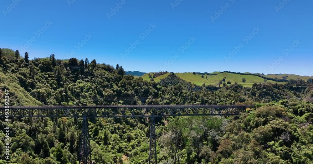 Flying towards Mangaweka railway Viaduct lush green fields - New Zealand Flying towards Mangaweka railway Viaduct lush green fields - New Zealand