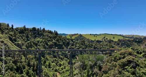 Flying towards Mangaweka railway Viaduct lush green fields - New Zealand photo