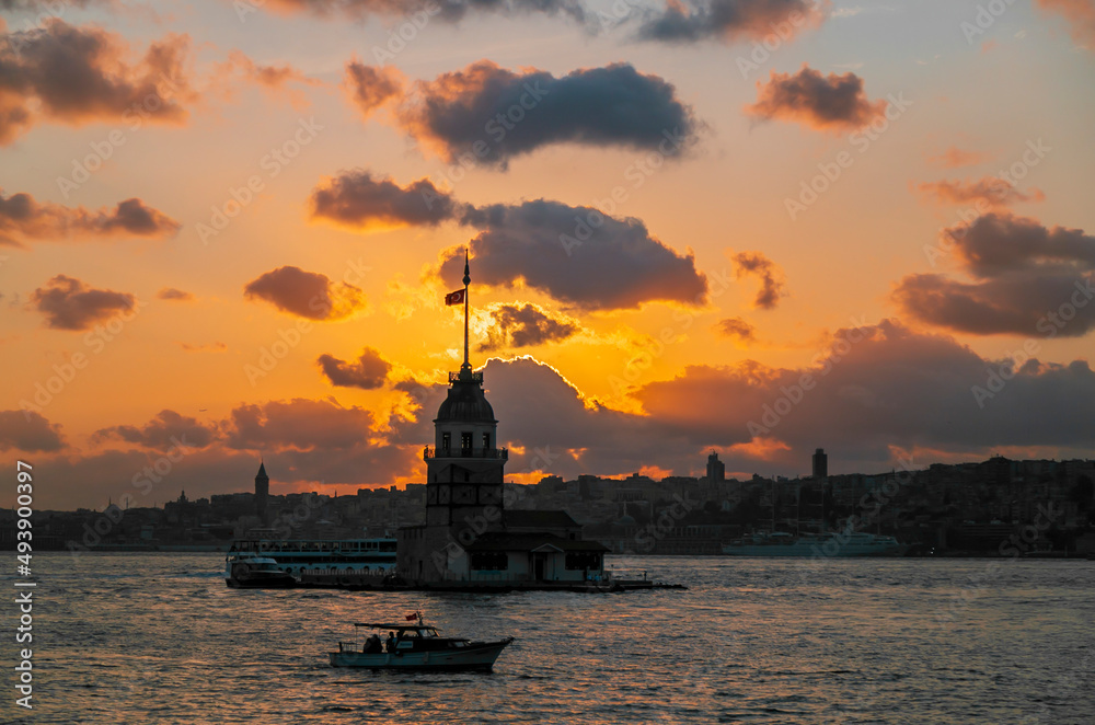 Maidens Tower at sunset, İstanbul. Beautiful clouds with blue sky. Historical light house of İstanbul