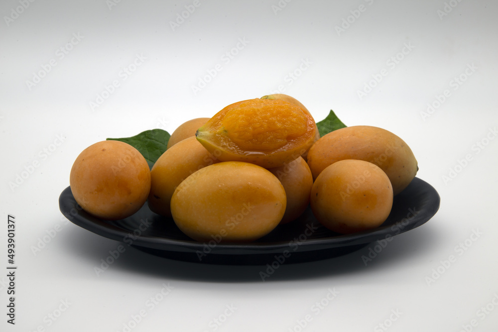 Mayongchid, seasonal fruit of Thailand, when ripe, yellow color, sour and sweet taste.Include Clipping Path. Mayongchid, seasonal fruit of Thailand, when ripe, yellow color, sour and sweet taste.Include Clipping Path.