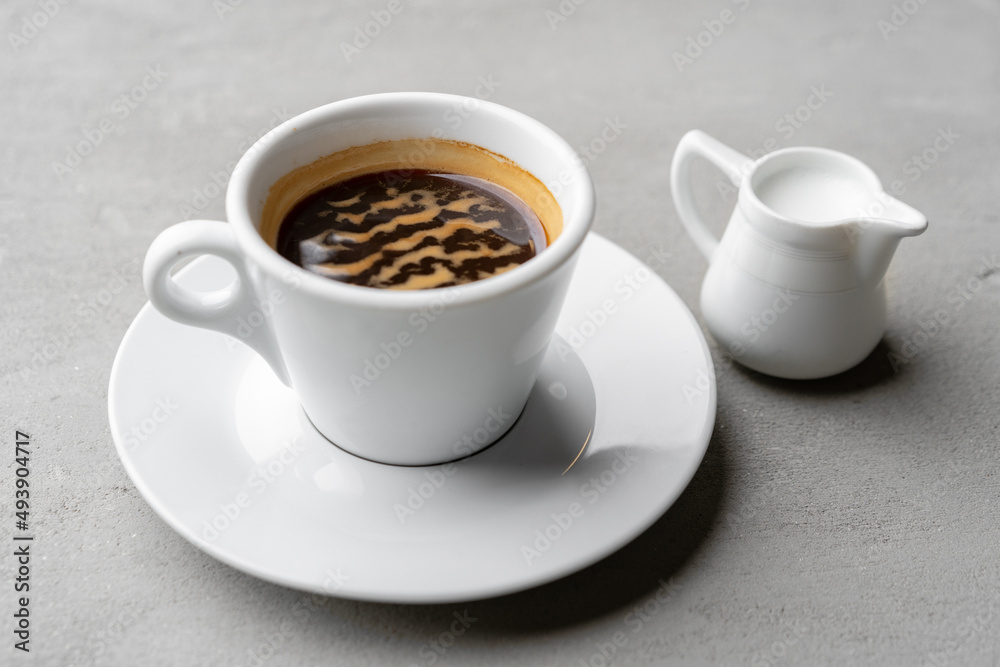 Cup of coffee drink on gray background close up Cup of coffee drink on gray background close up