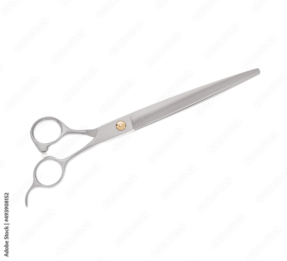 Scissors for cutting people and pets. Grooming scissors. Closed scissors on a white isolated background. Side view. Scissors for cutting people and pets. Grooming scissors. Closed scissors on a white isolated background. Side view.