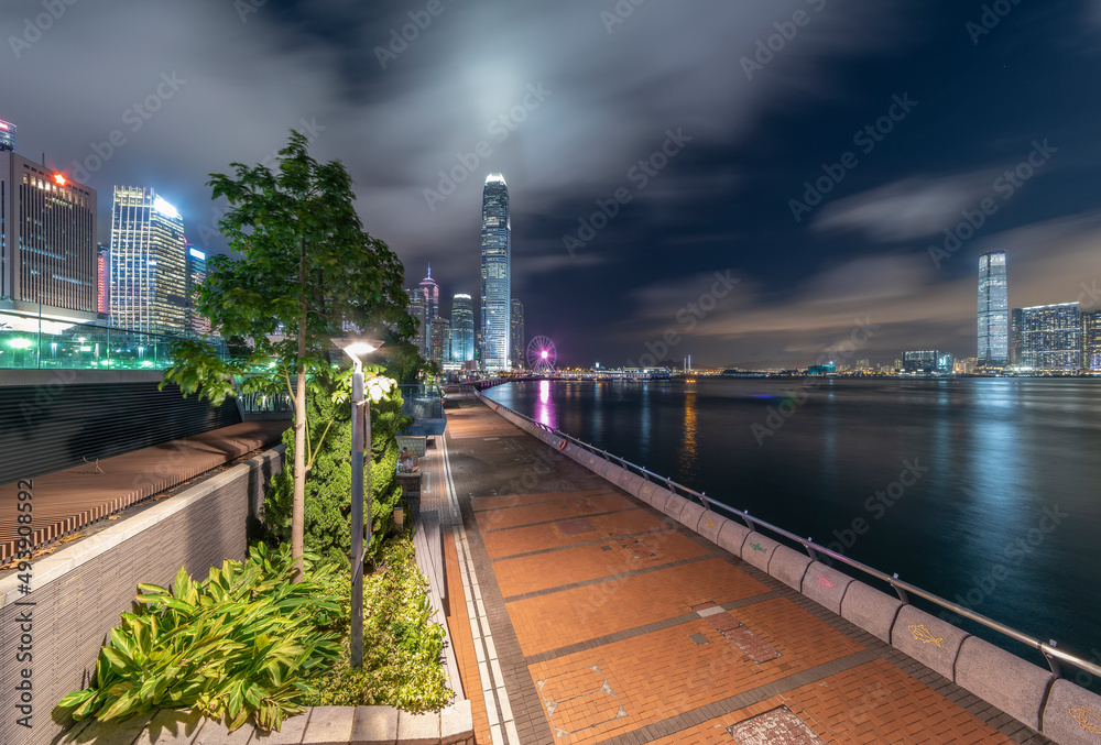Night scenery of skyline and Victoria harbor of Hong Kong city