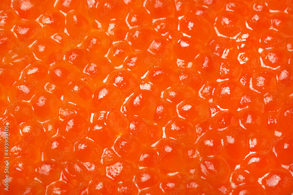 Pile of delicious red caviar as background, closeup Pile of delicious red caviar as background, closeup