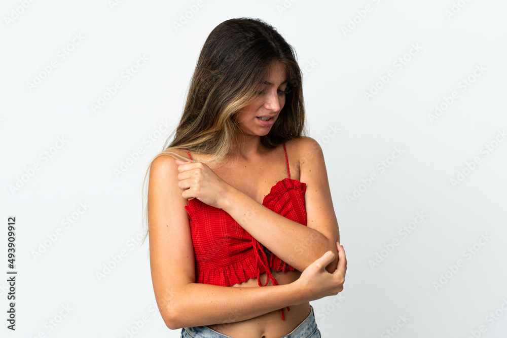 Young caucasian woman isolated on white background with pain in elbow Young caucasian woman isolated on white background with pain in elbow