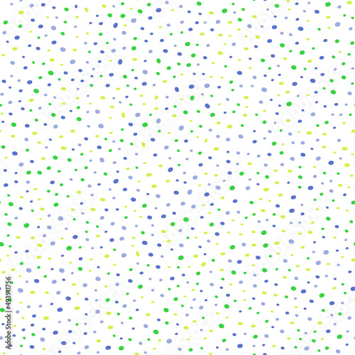 Bright summer pattern. Blue, yellow, light blue and green dots on a white background. Seamless vector texture design.