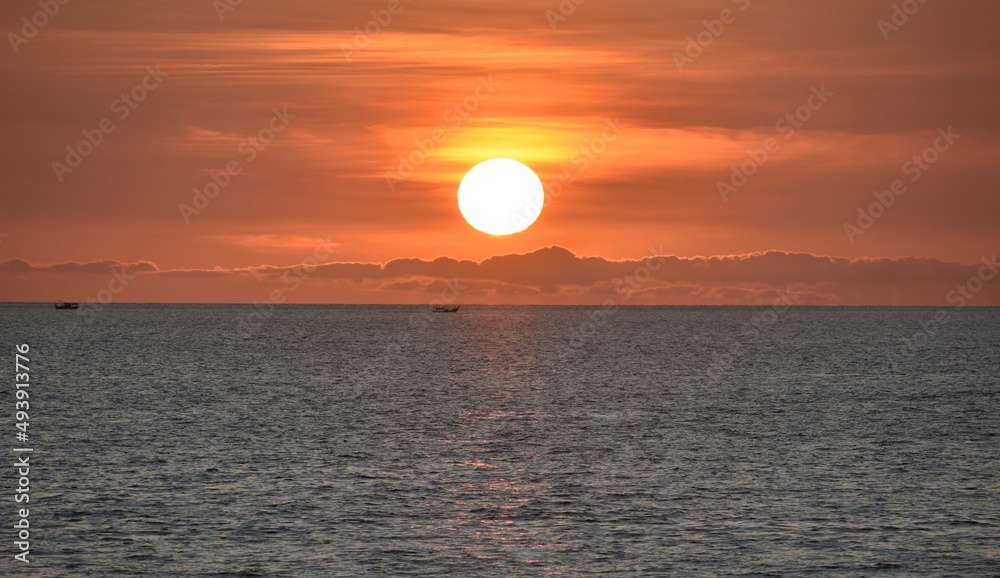 Beautiful sunset over the calm ocean
