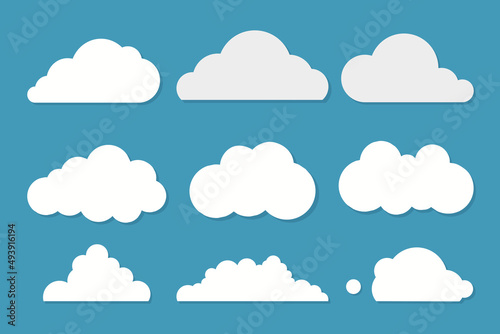 White clouds set on blue sky background. Vector