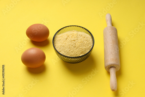 Concept of cooking cake or pie on yellow background