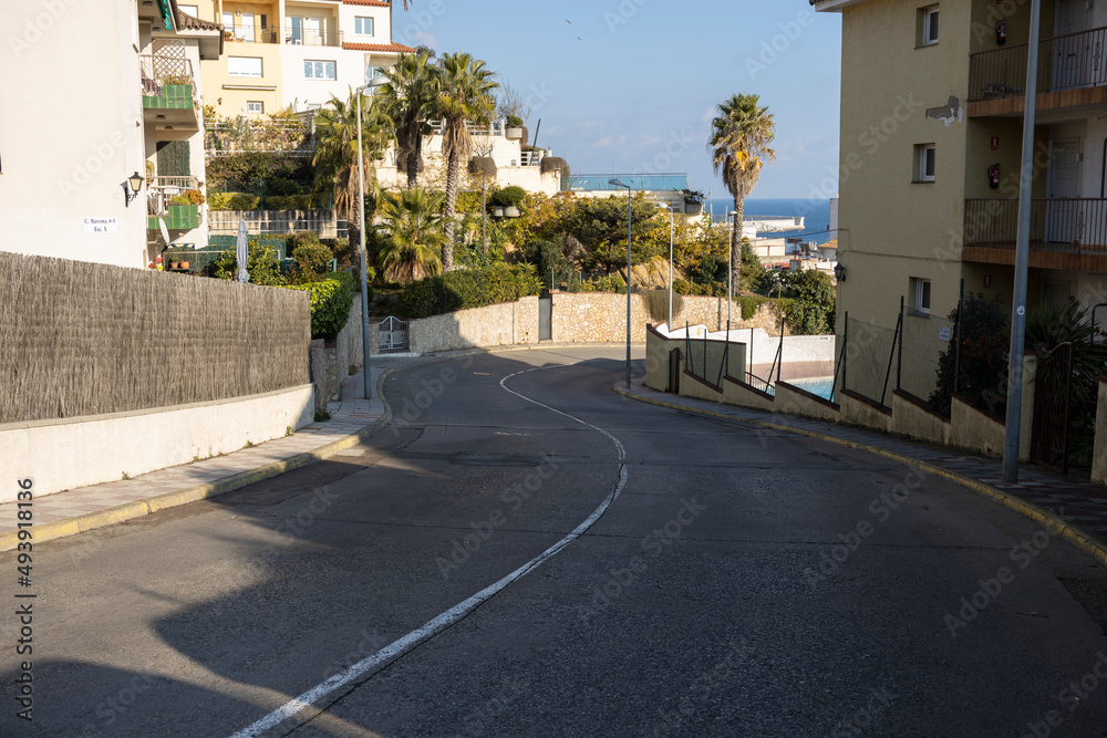 Winding road in the center of a tourist mediterranean city.