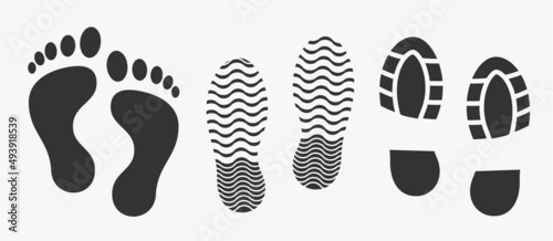 Black unique human footprints set isolated on white. Vector