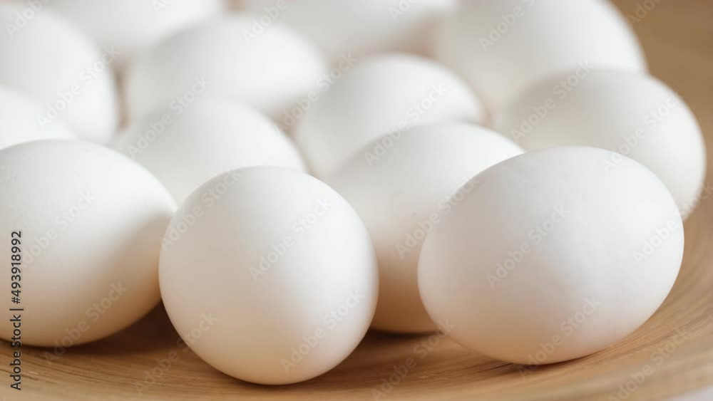 Chicken egg, rotation shot, Chicken fresh raw eggs.Healthy fresh food ingredients for breakfast. Animal products. Grocery. Chicken farm fresh eggs Chicken egg, rotation shot, Chicken fresh raw eggs.Healthy fresh food ingredients for breakfast. Animal products. Grocery. Chicken farm fresh eggs