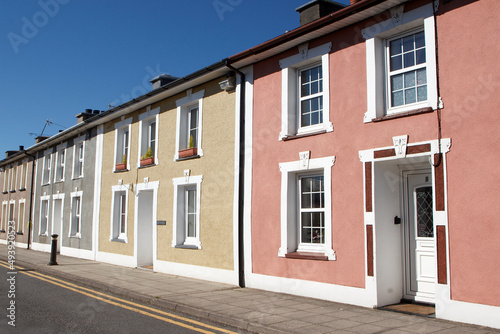 Back street in Aberaeron town on a sunny blue sky day. Yellow lines on the road prevent cars parking. © Jackie Davies