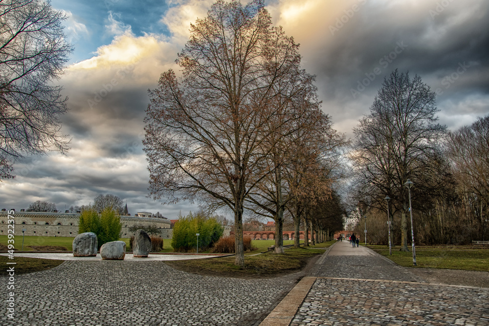Fototapeta premium park at sunset in Ingolstadt, beautiful sky with clouds