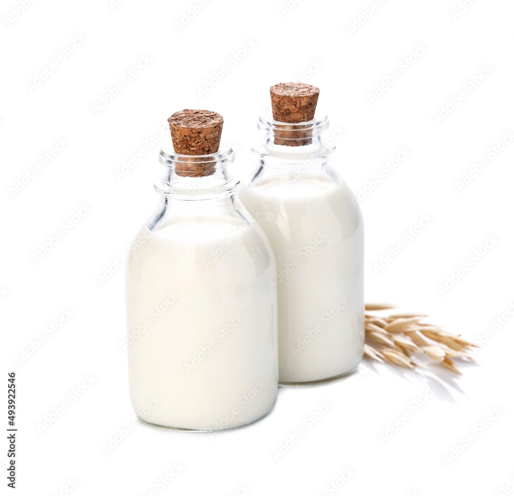 Milk of oats on bottle isolated on white backgrounds Milk of oats on bottle isolated on white backgrounds