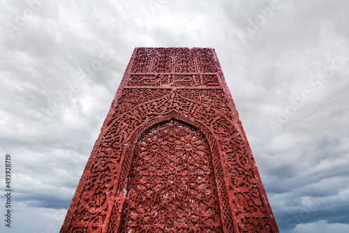 Historical Ahlat Seljuk Square Cemetery with islamic tombstones during winter under snow