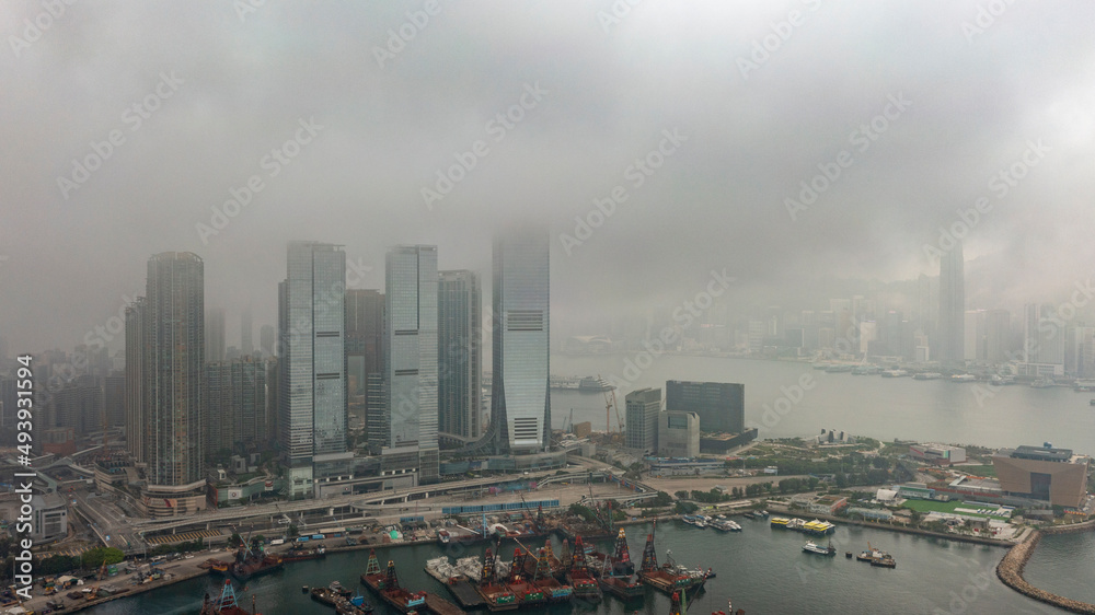 Φωτογραφία Hong Kong 18 March 2022,Aerial view of West Kowloon Cultural District on a foggy day