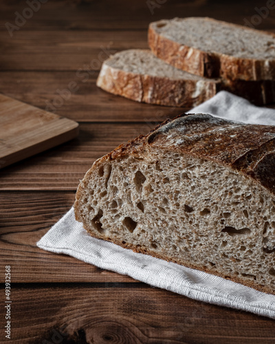 Sourdough bread on the wooden table photo