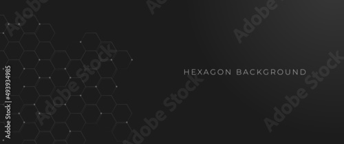 Black background with hexagon line decoration.