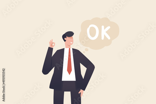 Ok sign , Businessman man standing showing ok sign with fingers.