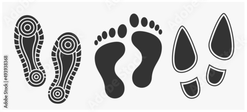 black Human footprints icon set isolated on white.