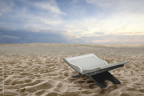 Canvas Print Quran open on a wooden placemat