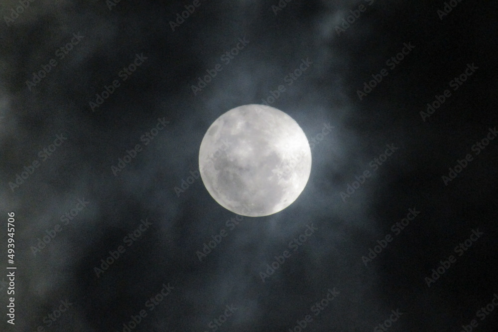photo of the moon and clouds in the beautiful night sky photo of the moon and clouds in the beautiful night sky