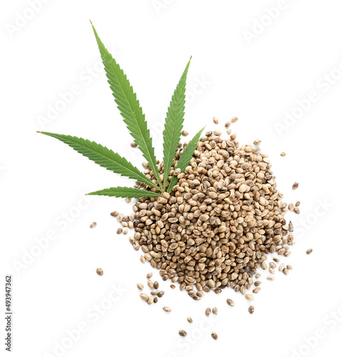 Heap of hemp seeds on white background