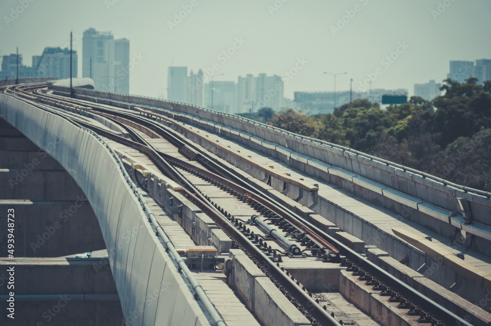 Naklejka premium Railway tracks of the electric train, the transportation of the future. Solving traffic problems in the capital.