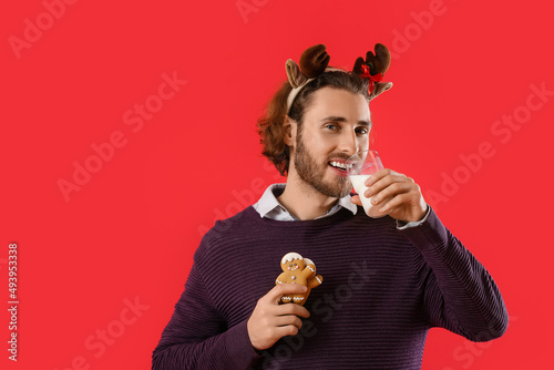 Handsome man in deer horns ...
