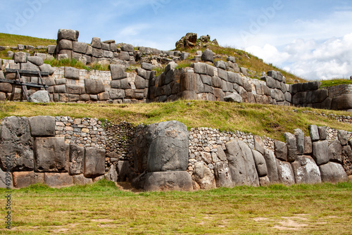 Saqsaywaman Inca archaeological site with large stone walls in Cusco, Peru photo