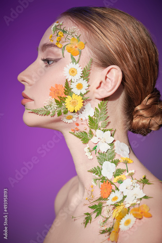 Fototapeta Naklejka Na Ścianę i Meble -  flowers on woman face