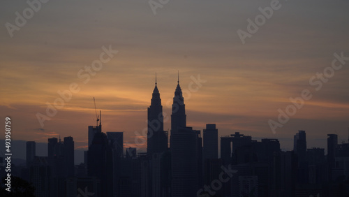 Canvas Print Beautiful view of the skyscrapers gleaming against the sunset in Kuala Lumpur