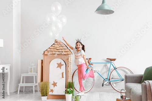 Funny little girl playing w...
