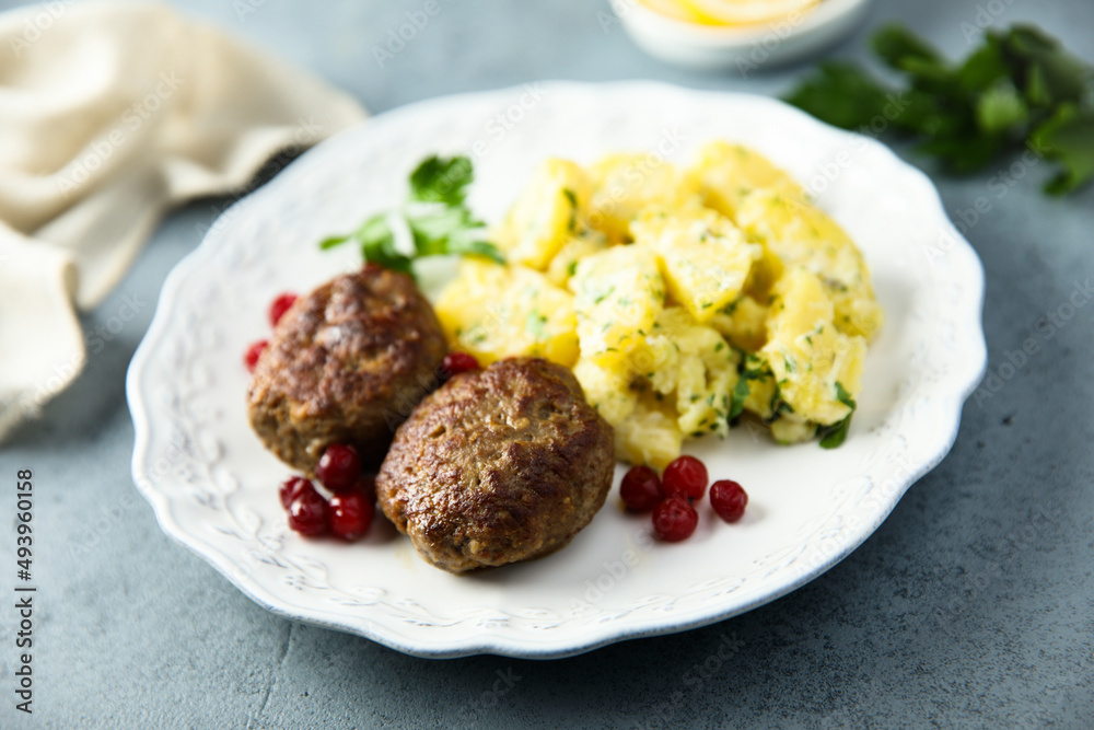 Homemade meatballs with cranberry and potato salad Homemade meatballs with cranberry and potato salad