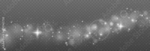 White sparks and glitter special light effect. Shining bokeh is isolated on a transparent background. Christmas light effect.