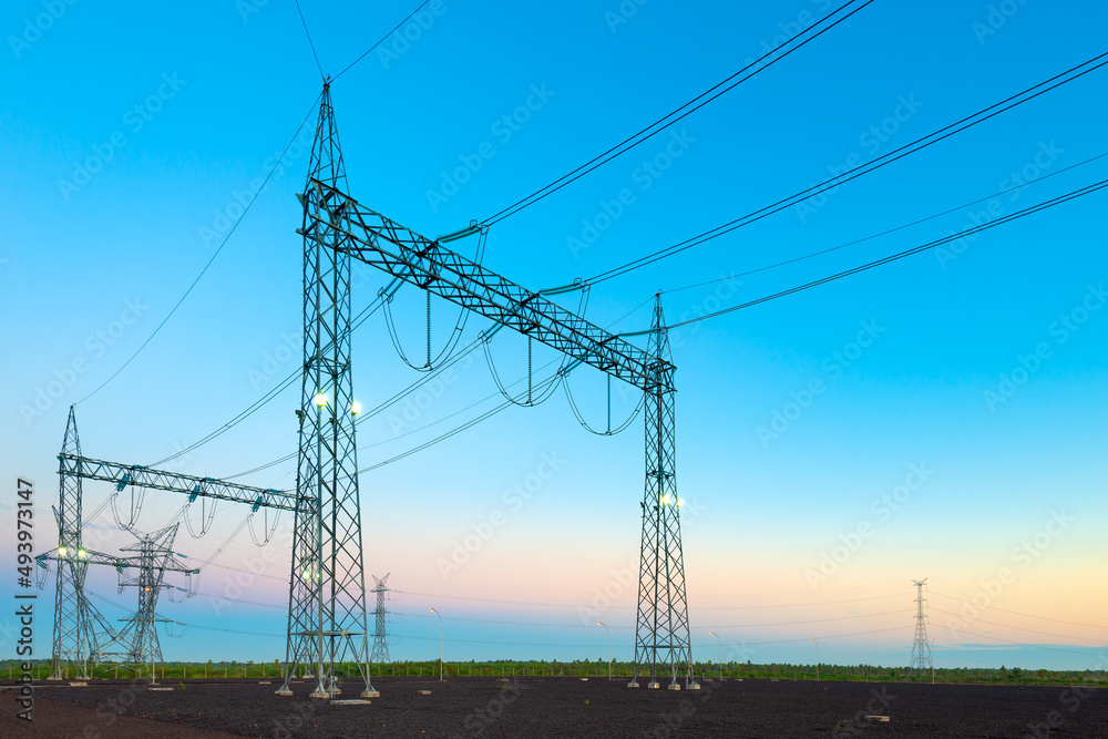 Electric substation and pwer lines in Paraguay at dawn. Electric substation and pwer lines in Paraguay at dawn.